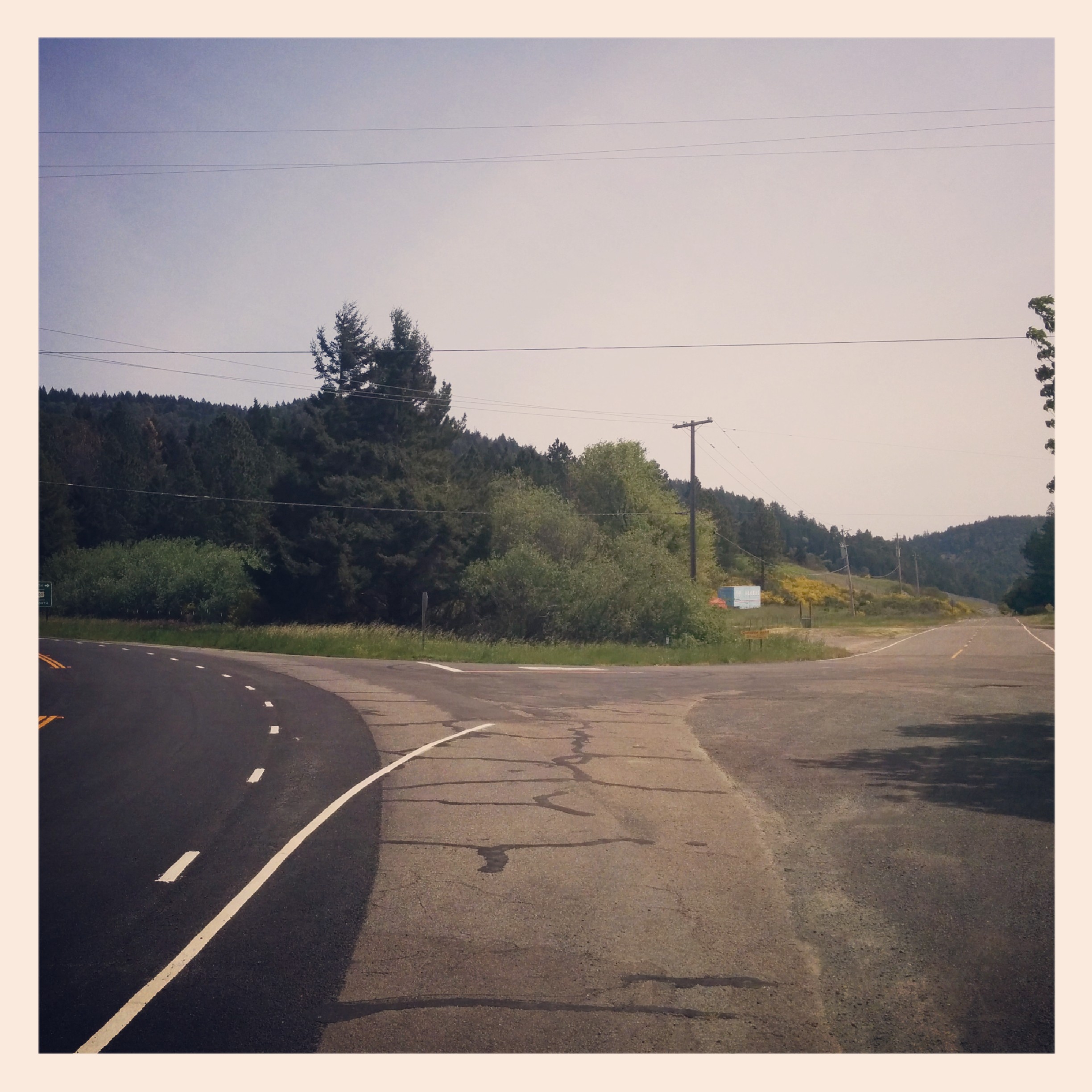 Took the 101 to Benbow which was uneventful as was Benbow. Got on a nice unused SR 271 that took me all the way to Piercy.

Here is the crossroads in Piercy. Literally town center. I think the only reason this place is a town is because it has a post office (which consists if a plywood 3-wall shelter and some apartment style mailboxes outside).