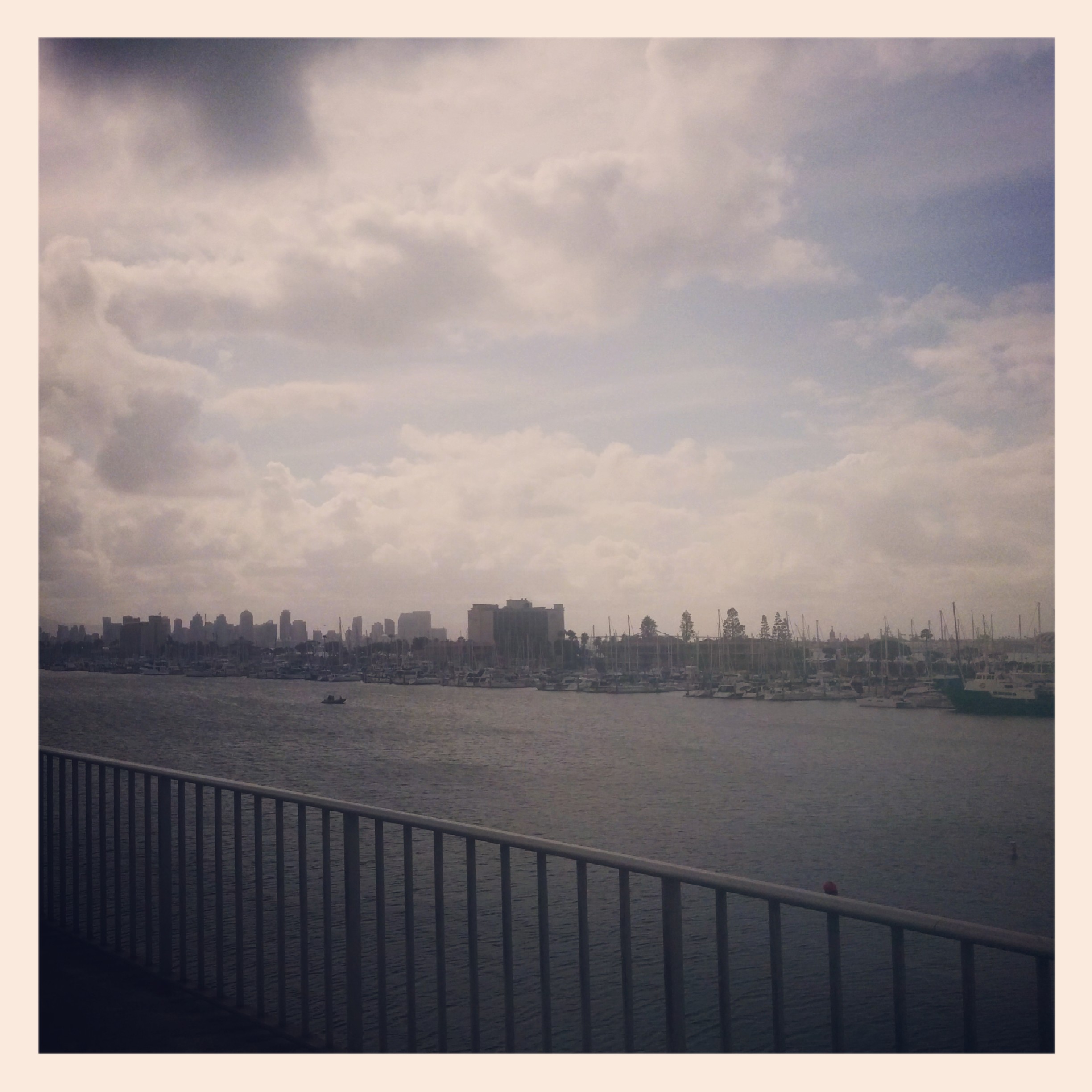 Went inland to get around the marina and caught my first glimpse of the cloudy gray San Diego skyline and some old boats. Hey! Isn't this place supposed to be sunny? I can get gray in Seattle.